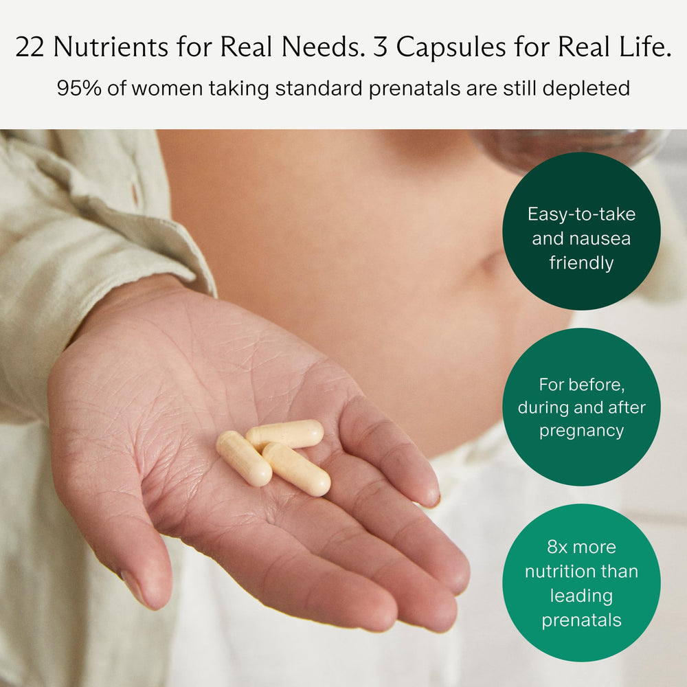 Needed Prenatal label close-up emphasizes 23 essential vitamins and minerals.