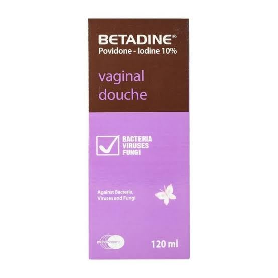 Nefertari Betadine vaginal douche cap shows controlled dosing.