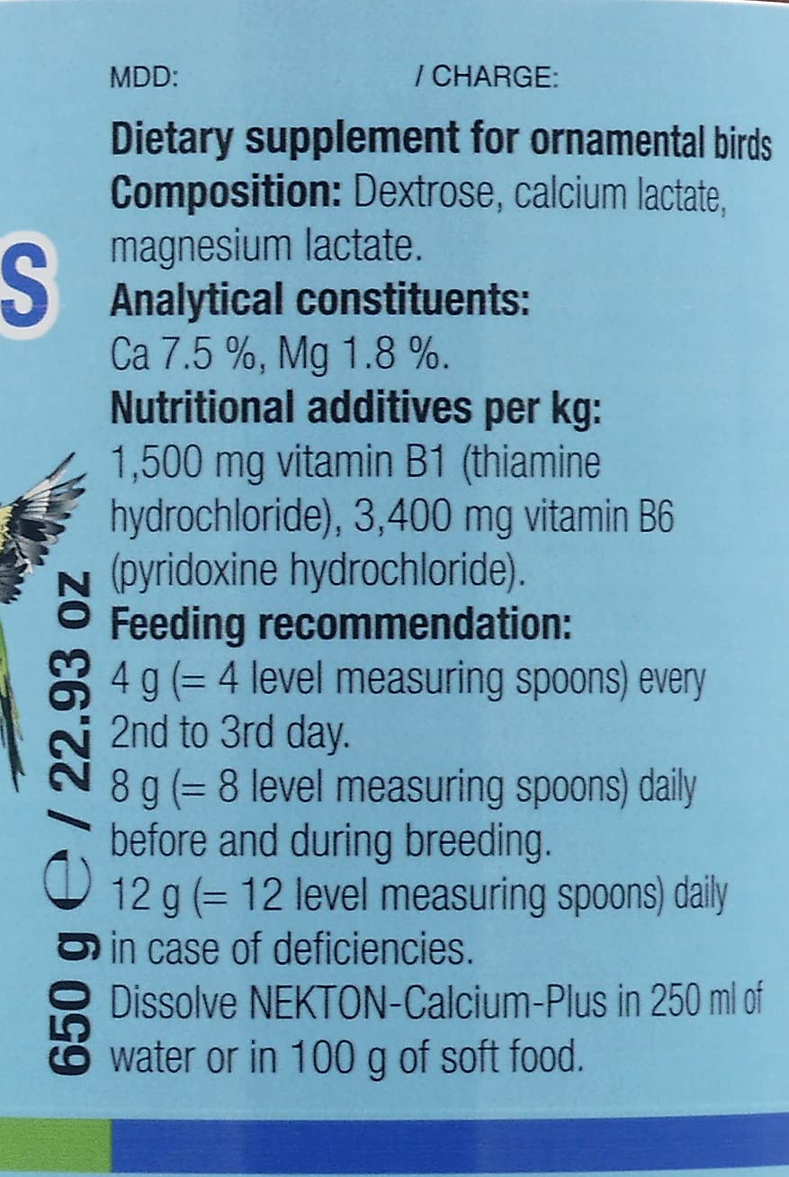 Powder scoop with Nekton Calcium-Plus beside bowl for balanced nutrition.