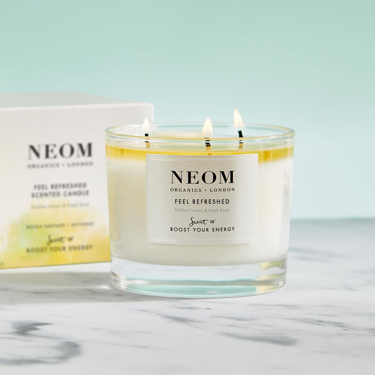 Neom Feel Refreshed closeup of amber wax enhances ambience