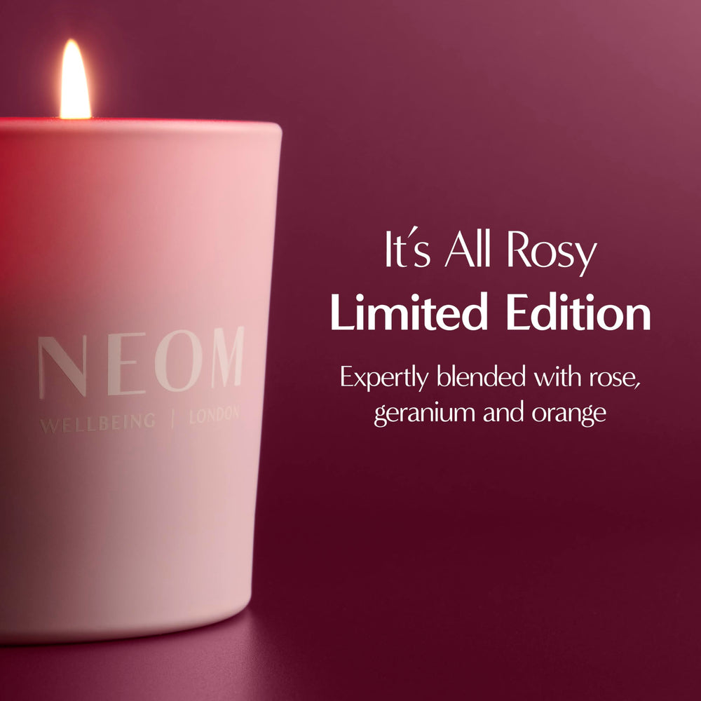 NEOM It's All Rosy Candle wax glow shows even burn potential.
