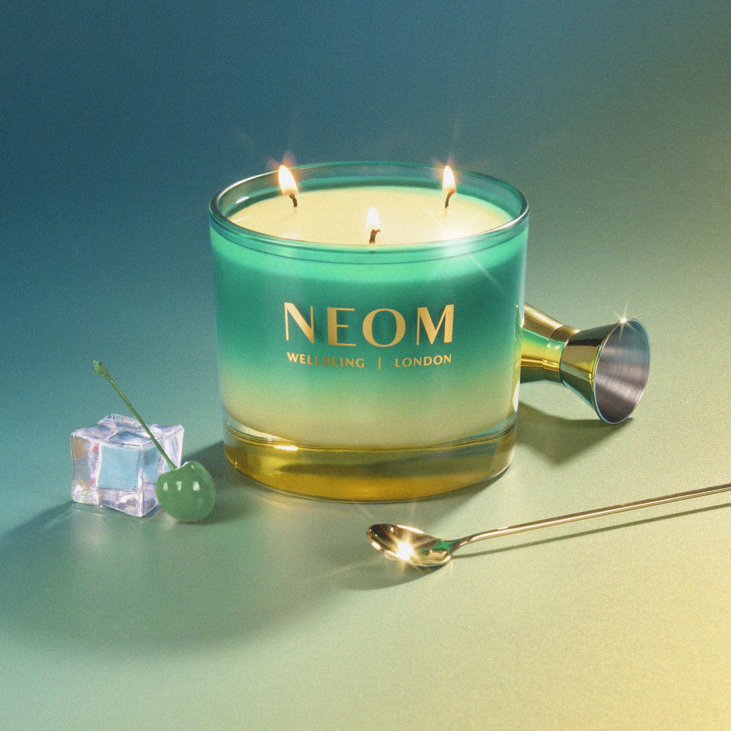 NEOM Perfect Peace jar shows essential oils and golden glow for calm