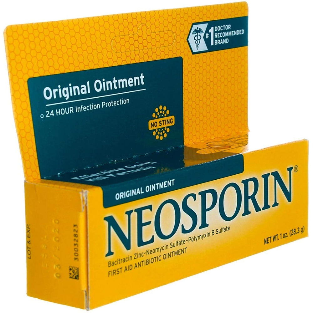 Applying Neosporin Original Ointment to a small cut for protection