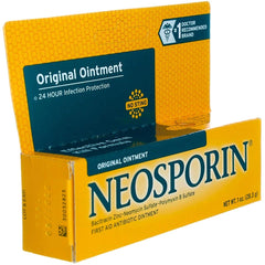Applying Neosporin Original Ointment to a small cut for protection
