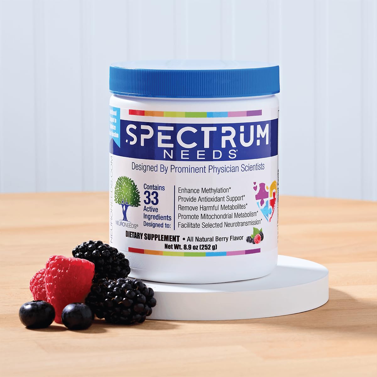 SpectrumNeeds berry flavor packaging close-up highlights tasty nutrition.