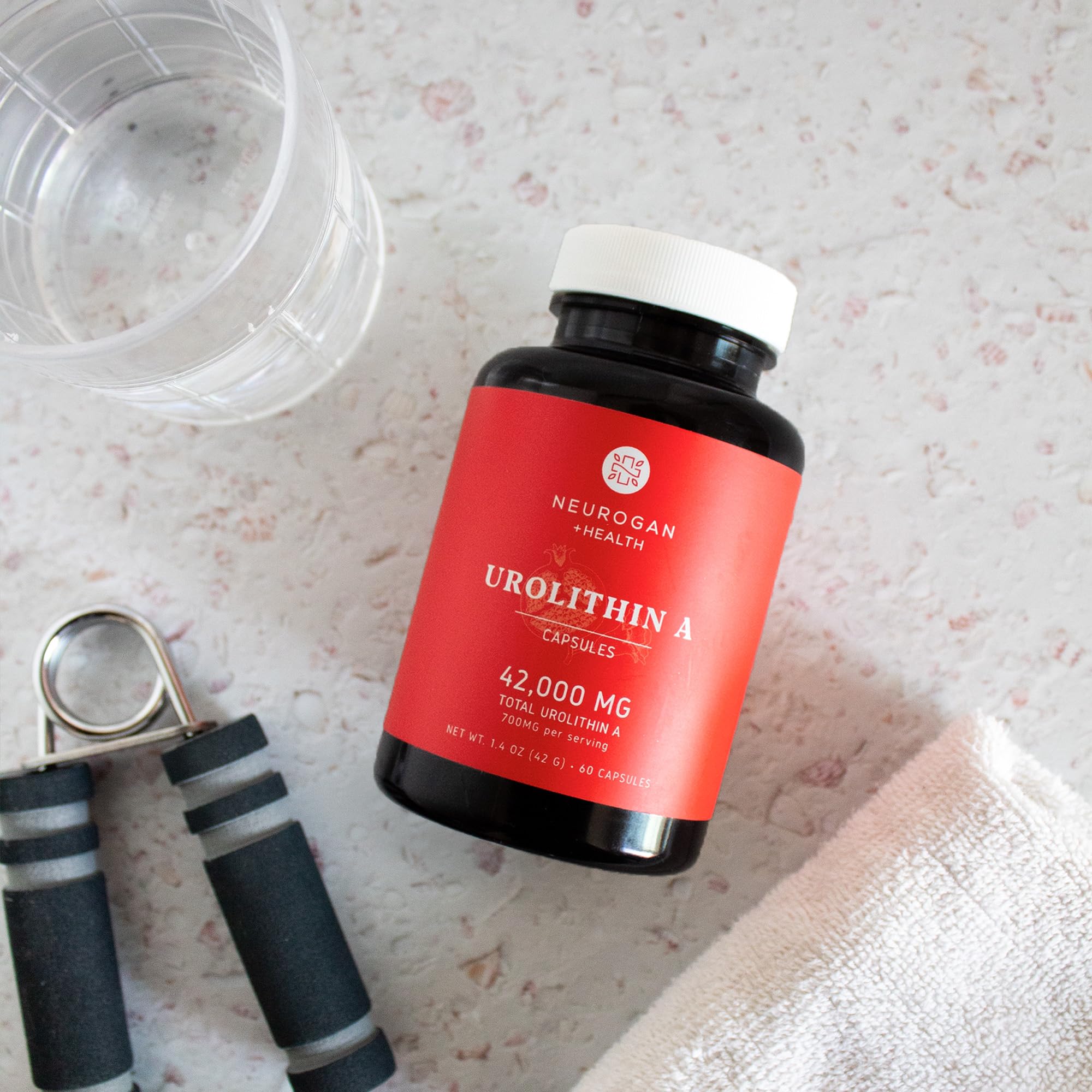 Pomegranate extract-inspired Neurogan Urolithin A capsule on shelf.