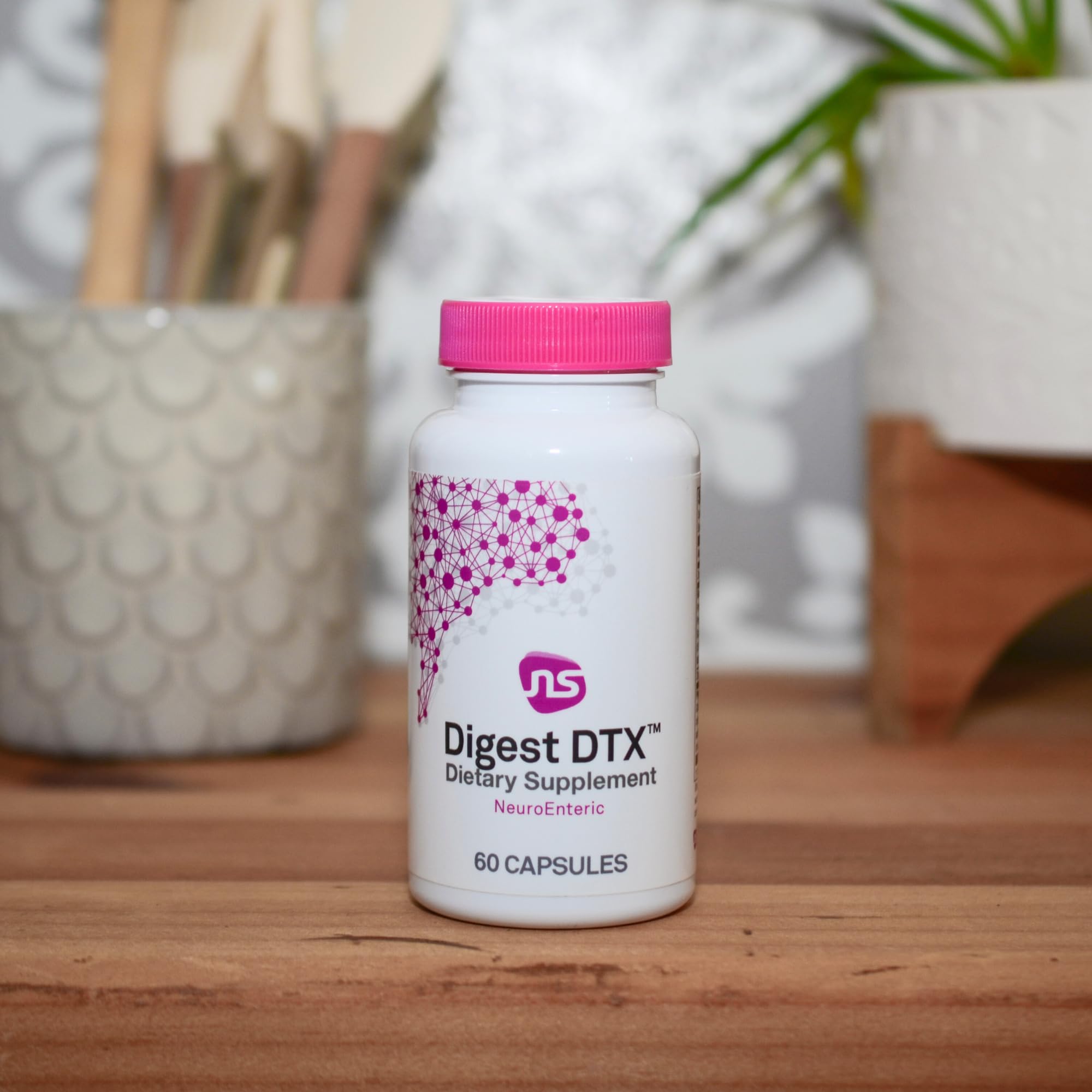NeuroScience Digest DTX label closeup emphasizes detox and immune support features.