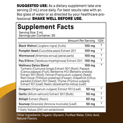 NEW AGE Black Walnut Wormwood Cleanse Drops bottle on shelf in a wellness setting