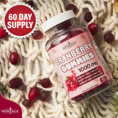 NEW AGE Cranberry Gummies bottle on countertop for daily wellness.