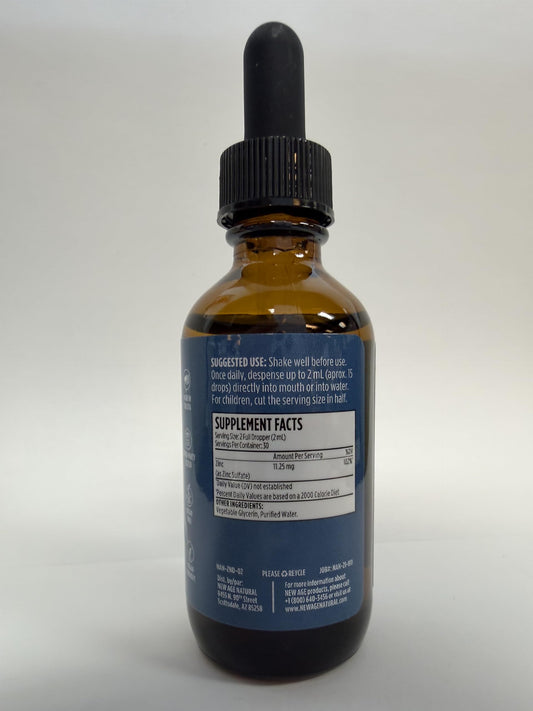 NEW AGE zinc drops dosing and bottle with cap, ideal for on-the-go routines.