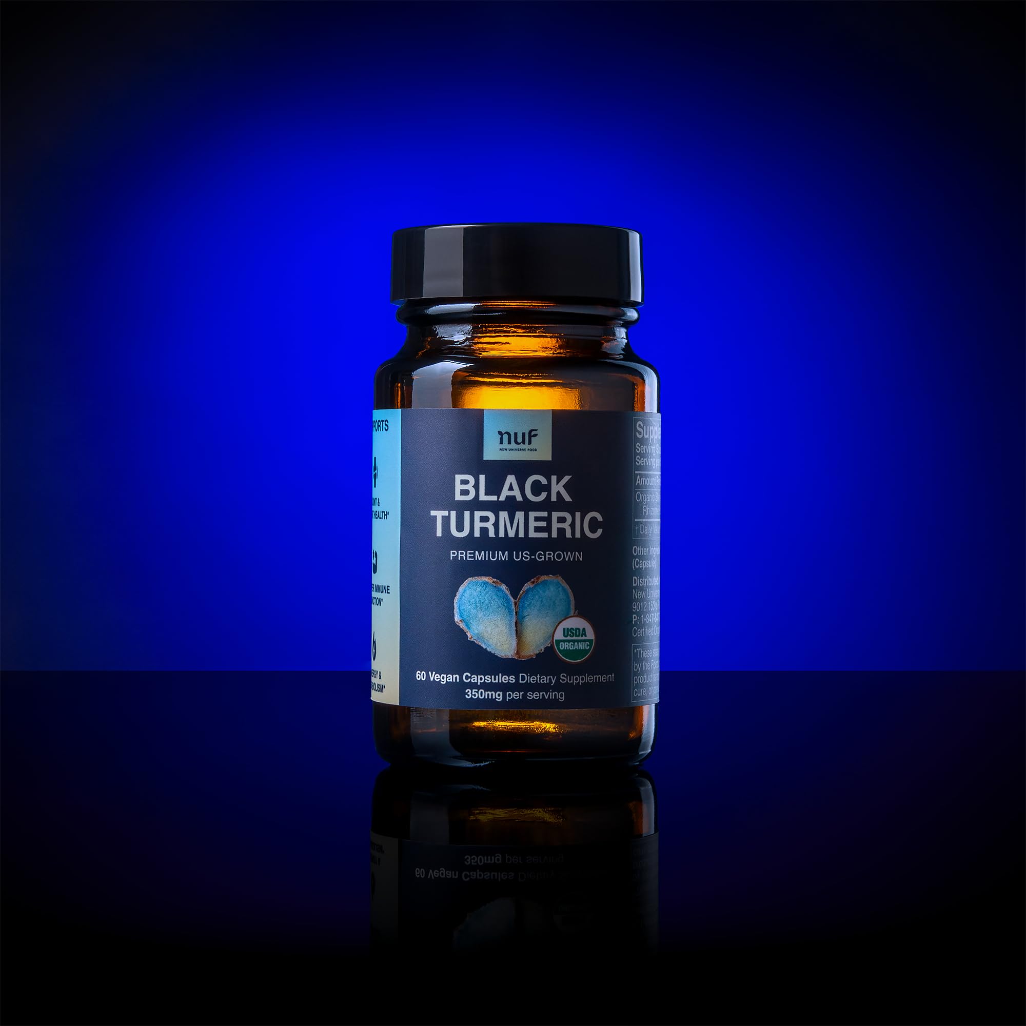 New Universe Food black turmeric capsules closeup reveals rich texture ideal for daily use