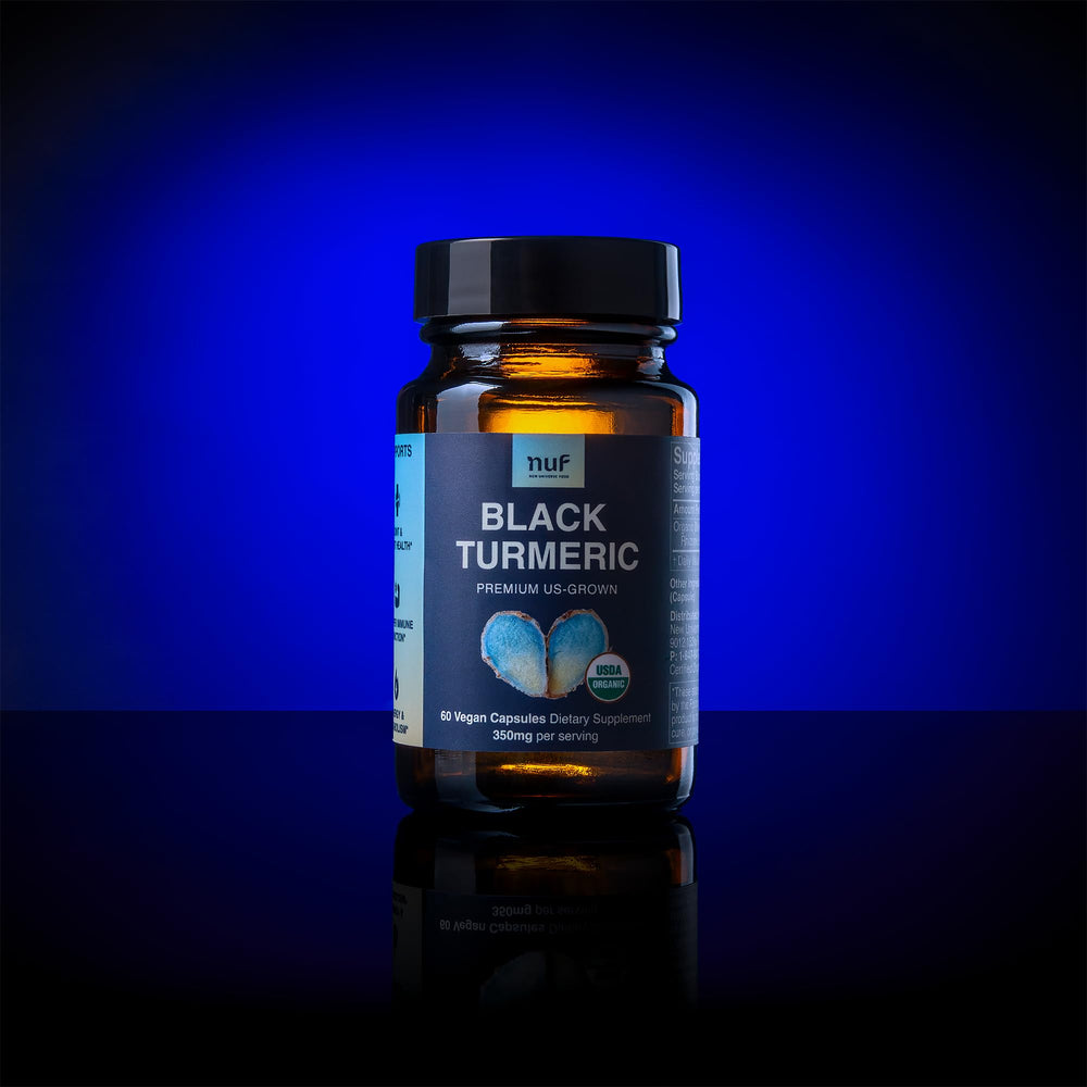 New Universe Food black turmeric capsules closeup reveals rich texture ideal for daily use