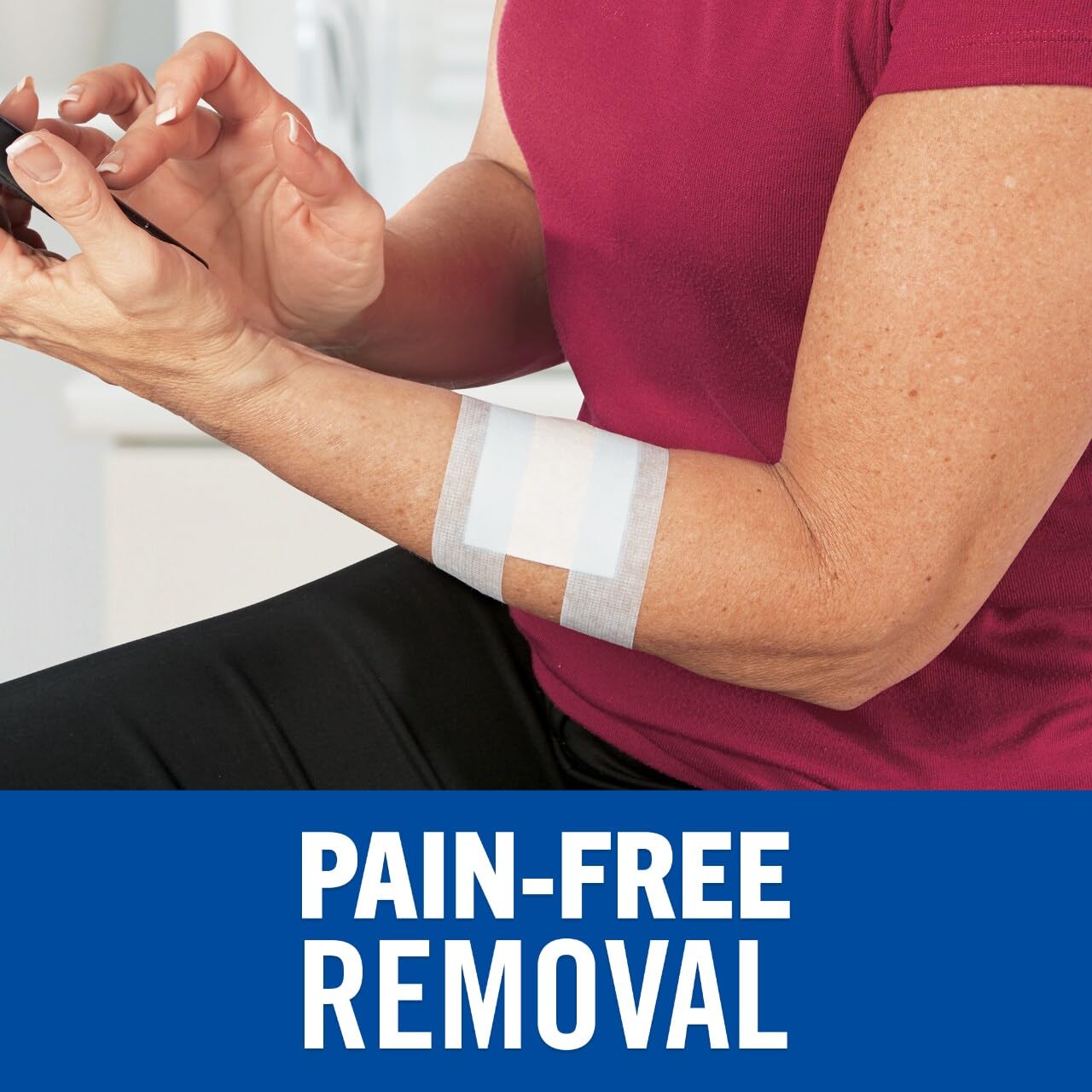 Nexcare Sensitive Skin Low Trauma Tape being applied on skin for secure dressing changes