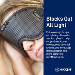 Nikken Kenko PowerSleep Mask worn over eyes during travel or meditation.