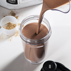 NOBULL Plant Protein pour action highlights quick mixability and chalk-free texture.