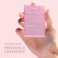 Noshinku hand spray in use on hands for quick moisturization.