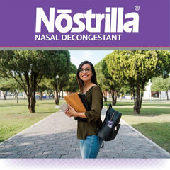 Nostrilla nasal spray on a table with tissues suggesting everyday relief