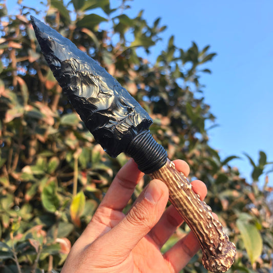 NsmjodStone crystal arrow knife head for focused display and energy aesthetic.