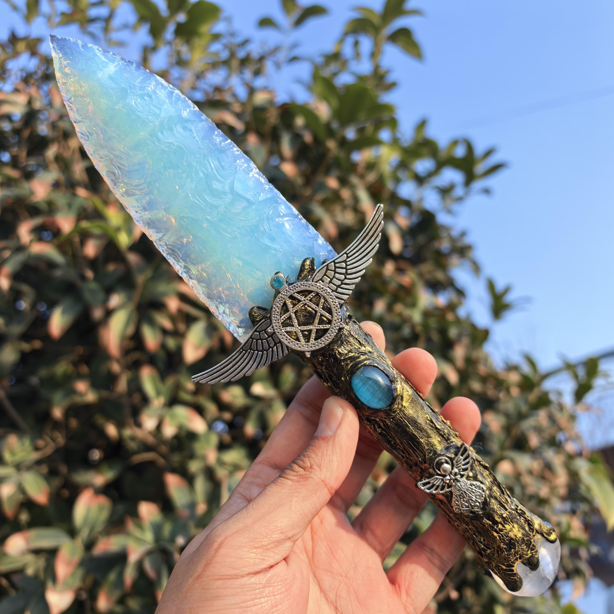 NsmjodStone crystal knife arrow head in opal obsidian for chakra balance.