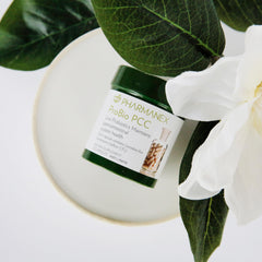 Swallowing Nu Skin ProBio PCC capsule for convenient health support.