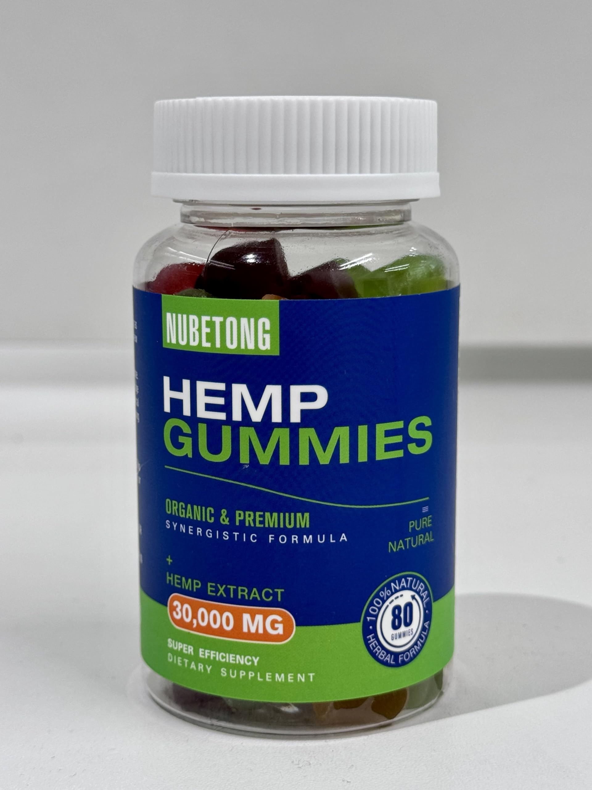 Close-up of Nubetong gummies bottle highlighting organic extract