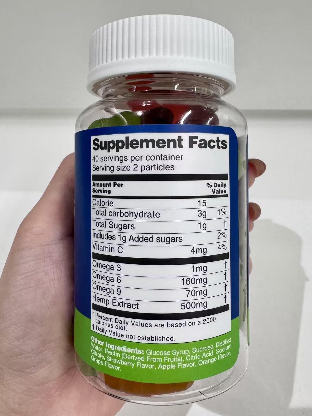 Ingredients panel close-up showing vegan, non-GMO formula