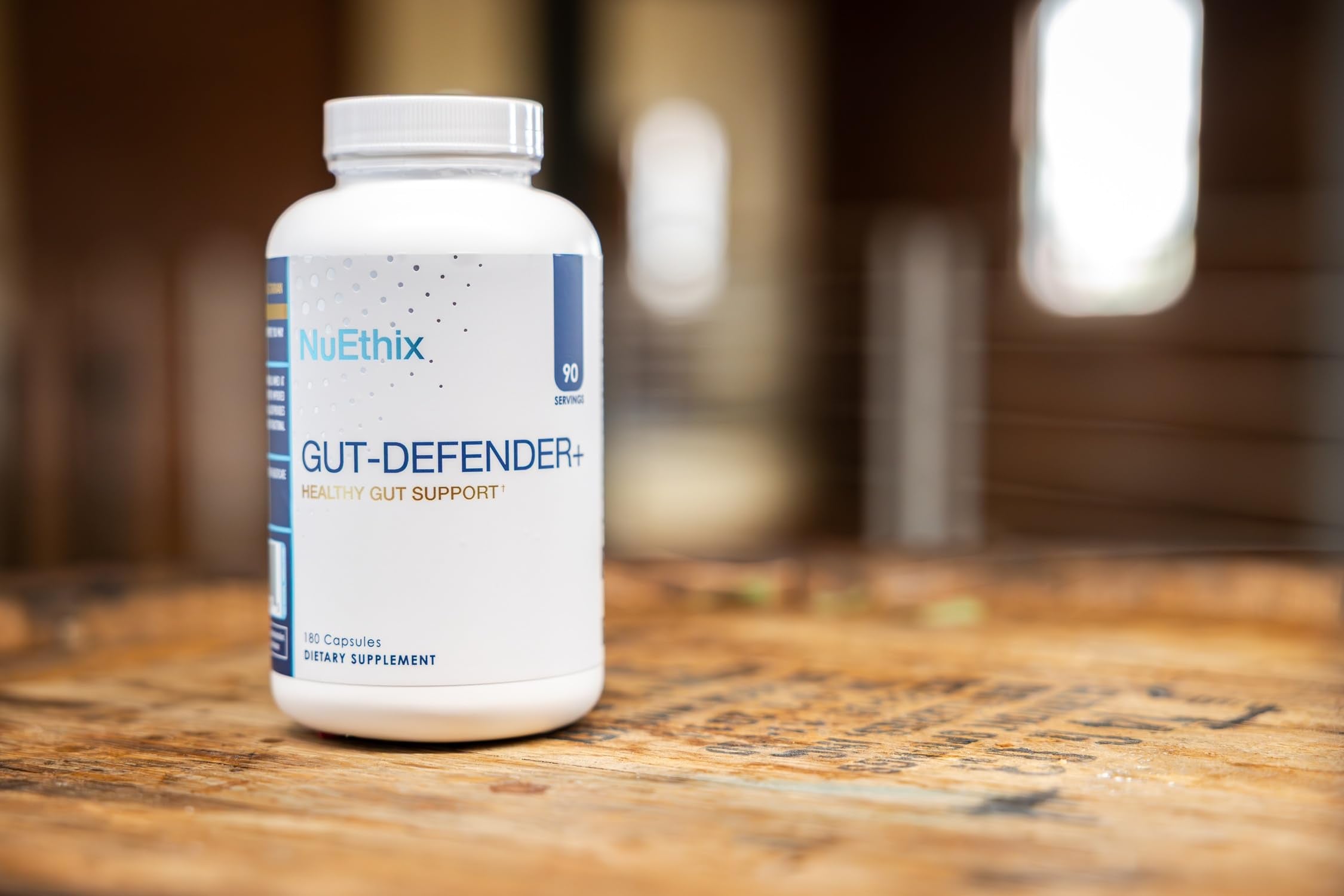 NuEthix Gut Defender+ dosing scoop demonstrates convenient serving guidance.