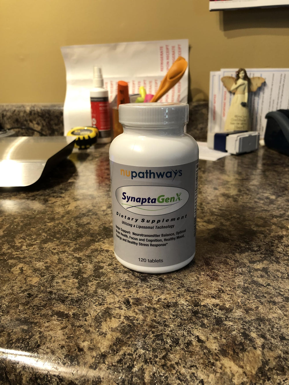NuPathways SynaptaGenX capsules with natural extracts on neutral background