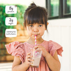 Prepared Nurished Mighty Milk shake in a glass with vanilla aroma.