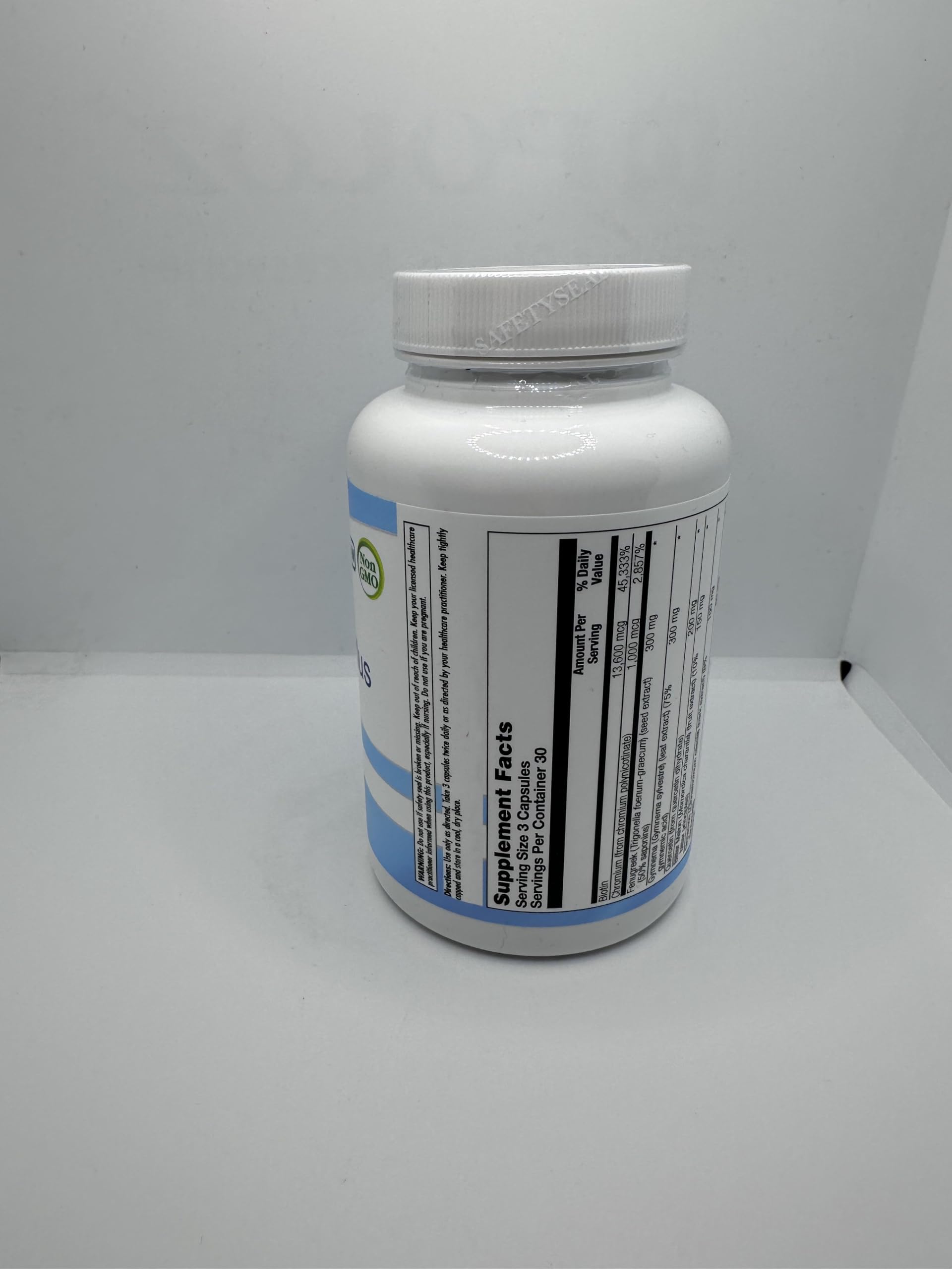 Nutra Biogenesis Diabetone Plus packaging display with product information.