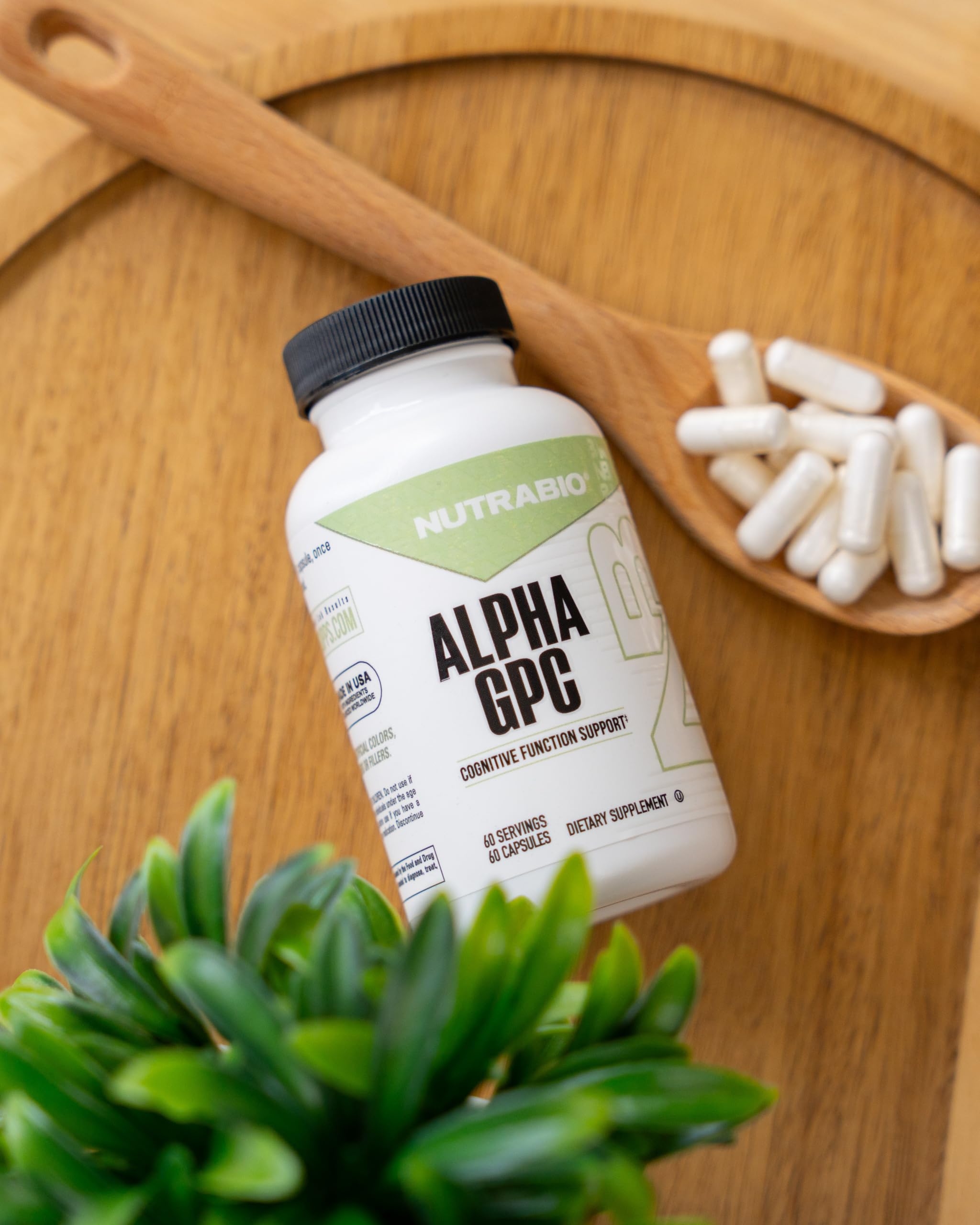 NutraBio Alpha GPC capsules being dispensed for daily focus use