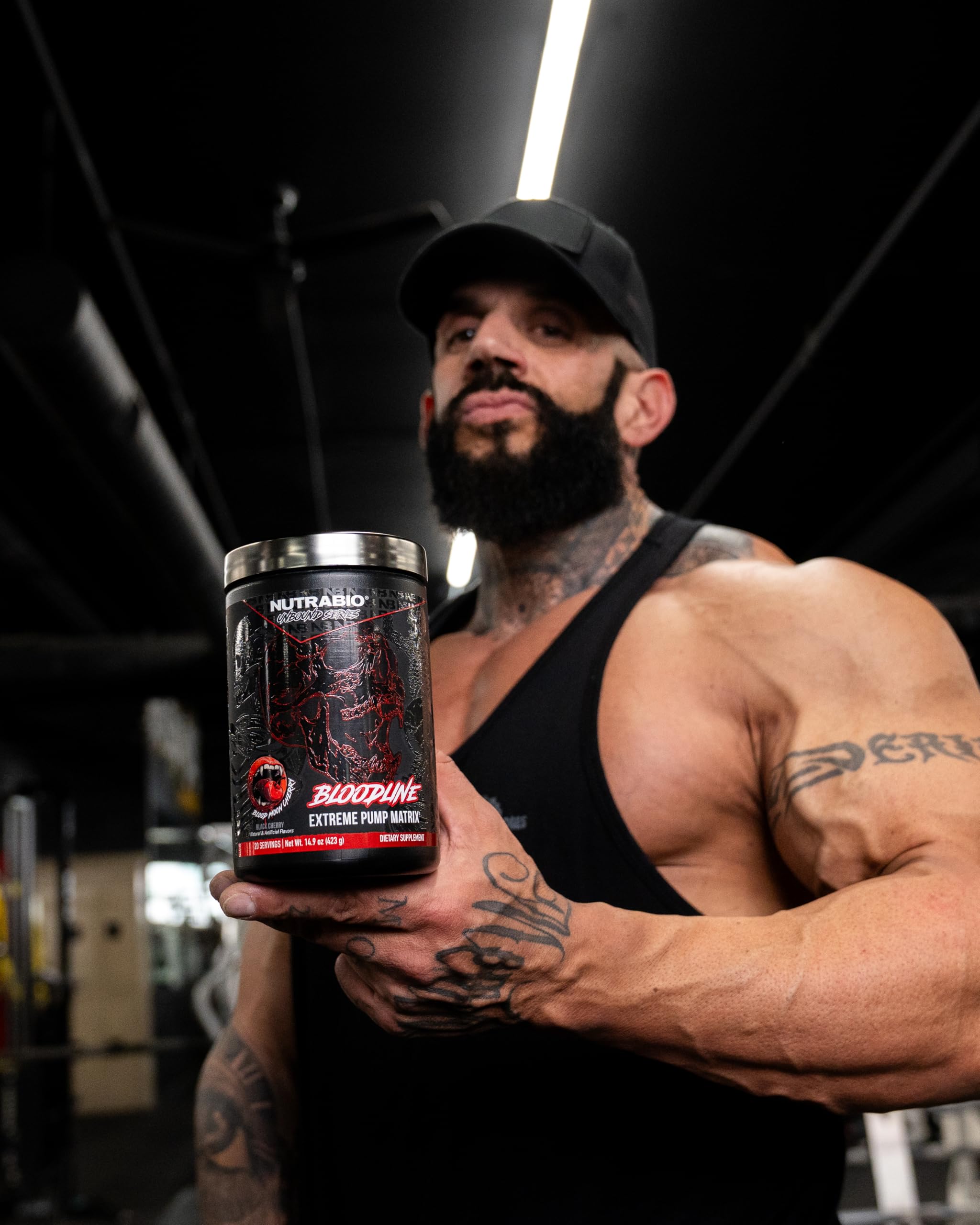 Bloodline bottle with glass of water, emphasizing hydration for endurance.
