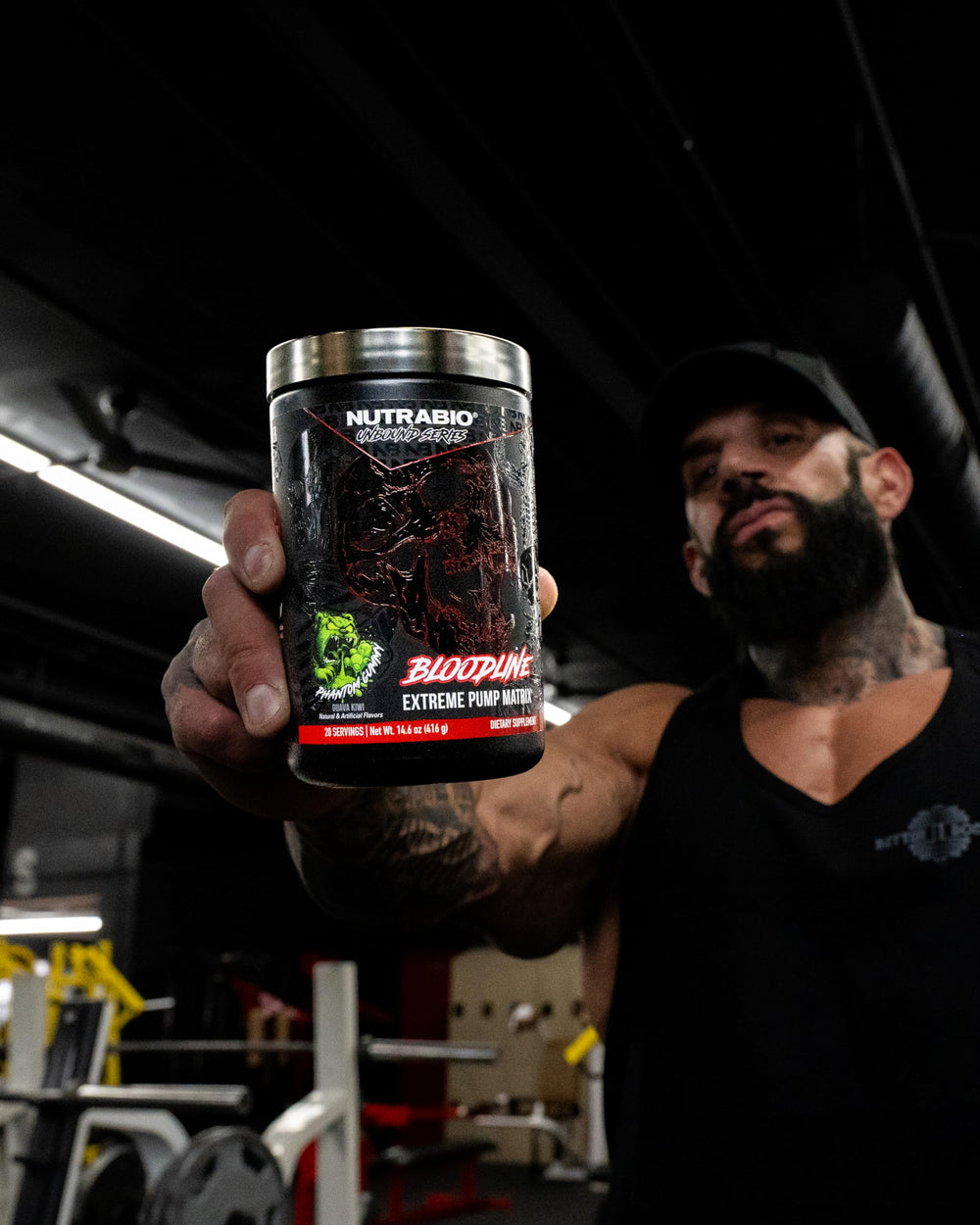 NutraBio Bloodline pour into water showing quick mix for pre-workout