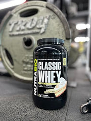 NutraBio Classic Whey Banana Cream Pie scoop demonstrates a convenient 25 g protein per serving.