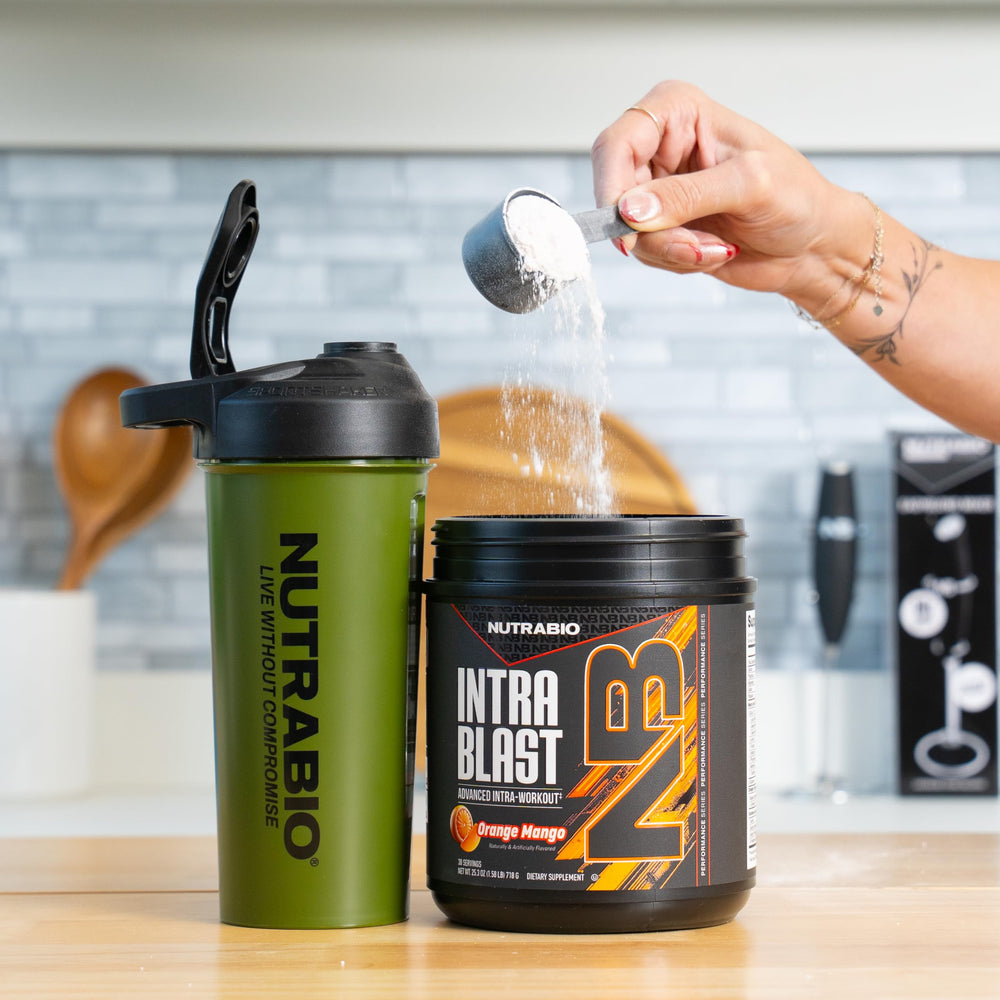 NutraBio Intra Blast Orange Mango label close-up highlighting 9 essential amino acids.