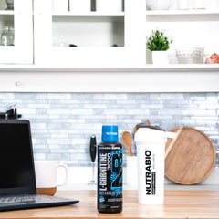 Side-view of NutraBio L-Carnitine Liquid Shots bottle highlighting the design.
