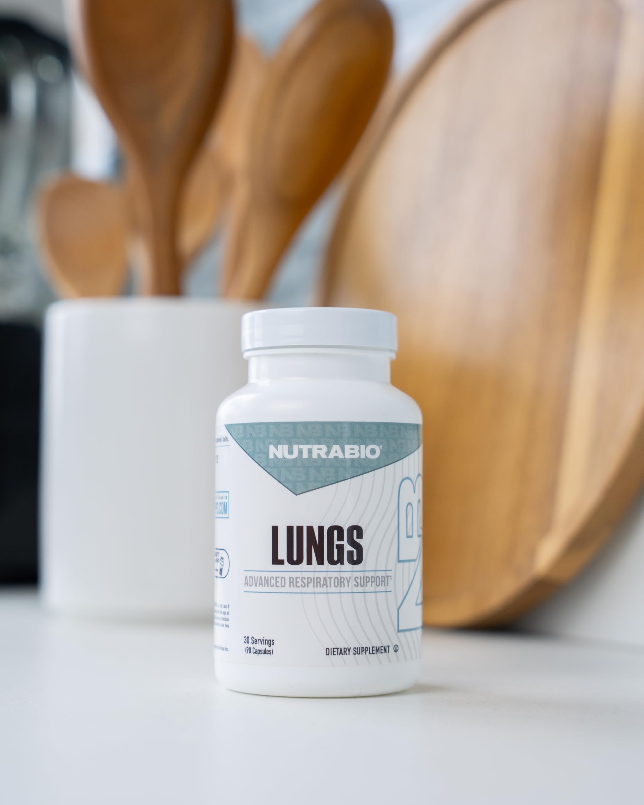 NutraBio Lungs daily use on a calendar shows a 3-capsule routine.