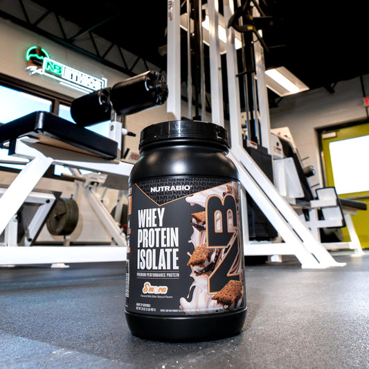 NutraBio Whey Isolate label close-up highlights clean, non-GMO formula