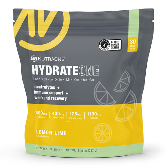 NutraOne HydrateOne lemon-lime stick pack in use for quick on-the-go hydration.