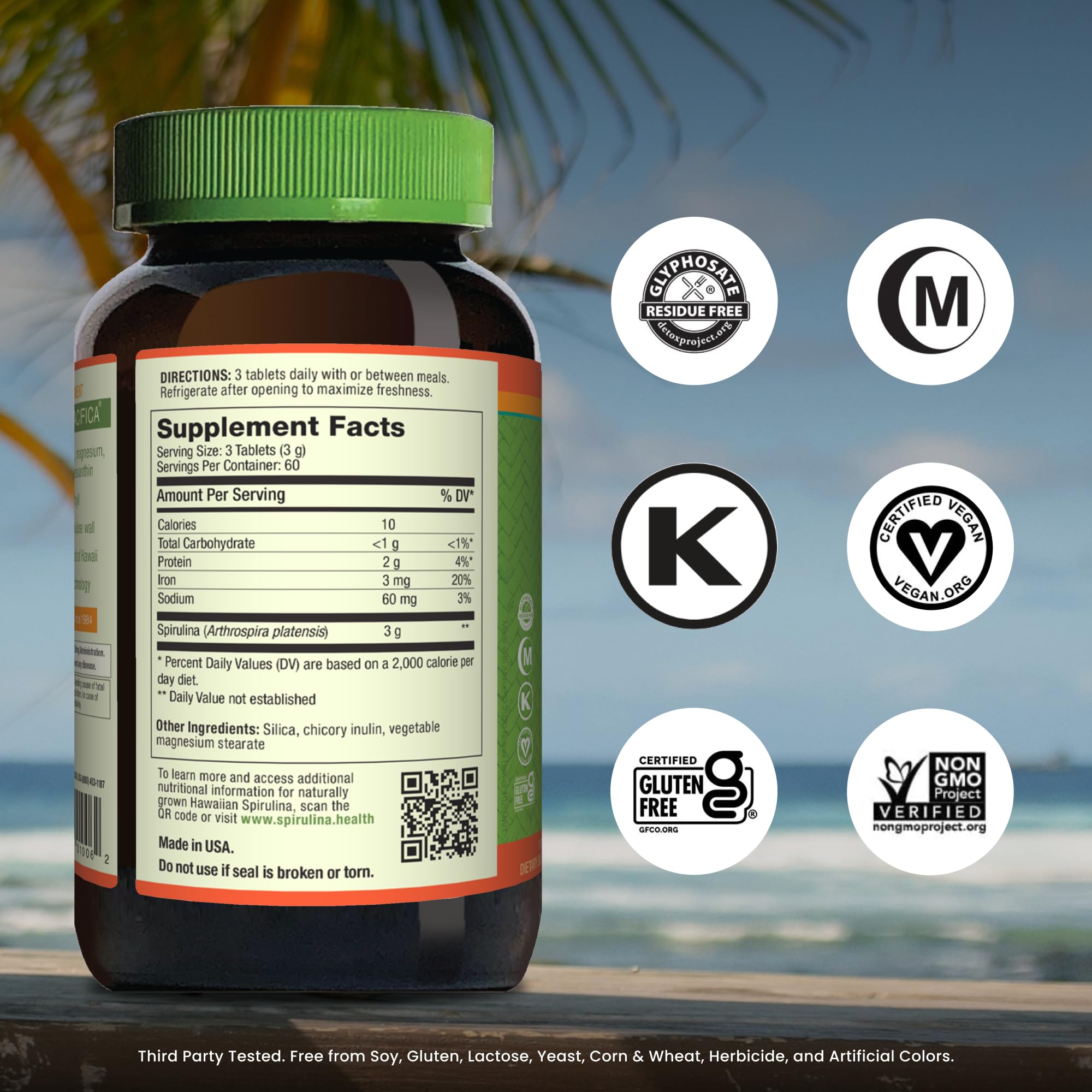 Nutrex Hawaii spirulina tablets on kitchen counter for easy daily use.