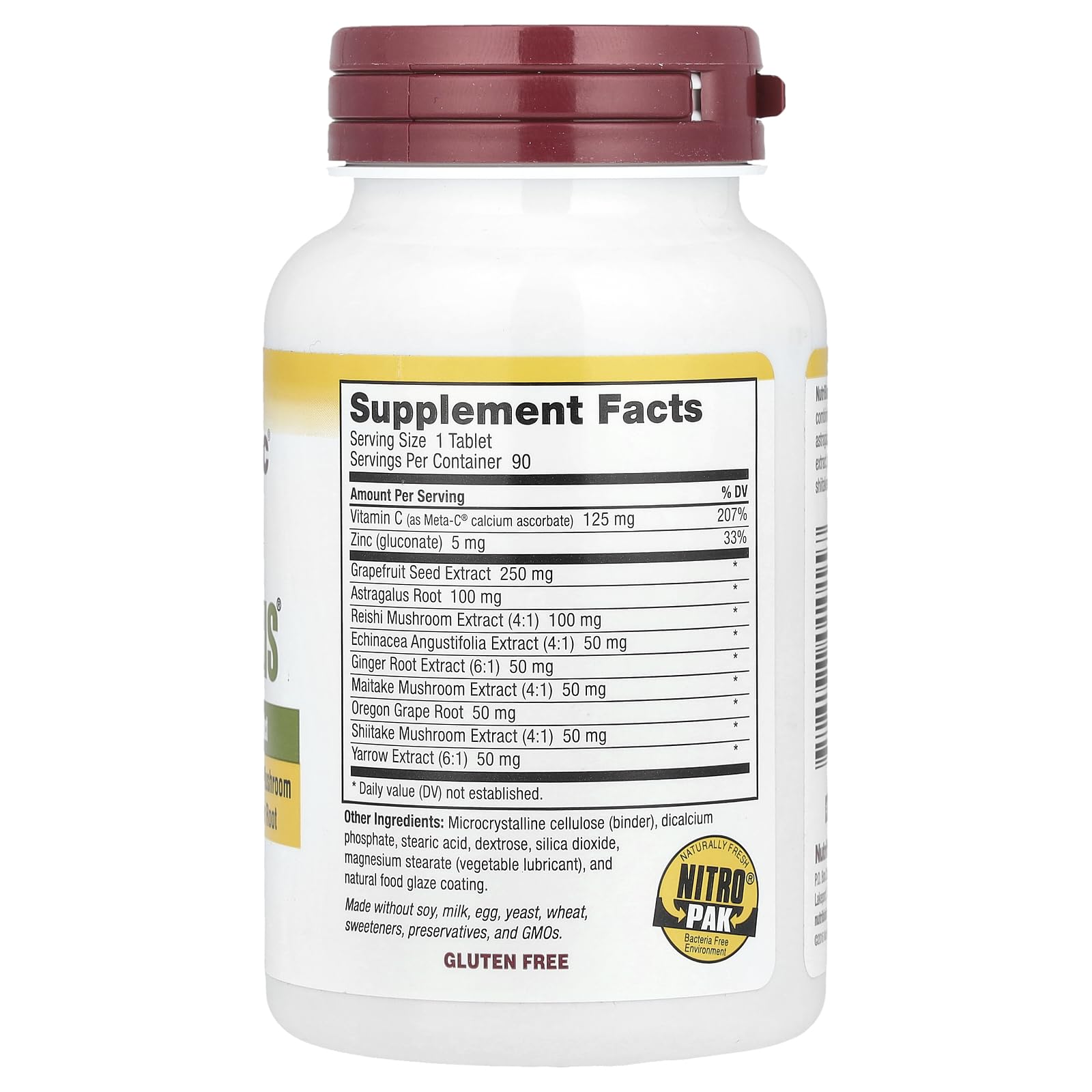 NutriBiotic Defense Plus tablets close-up showing plant-based formula.