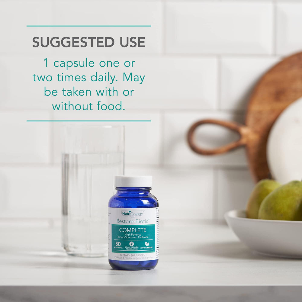 Nutricology Restore-Biotic Complete packaging on shelf signals travel-friendly, shelf-stable solution.
