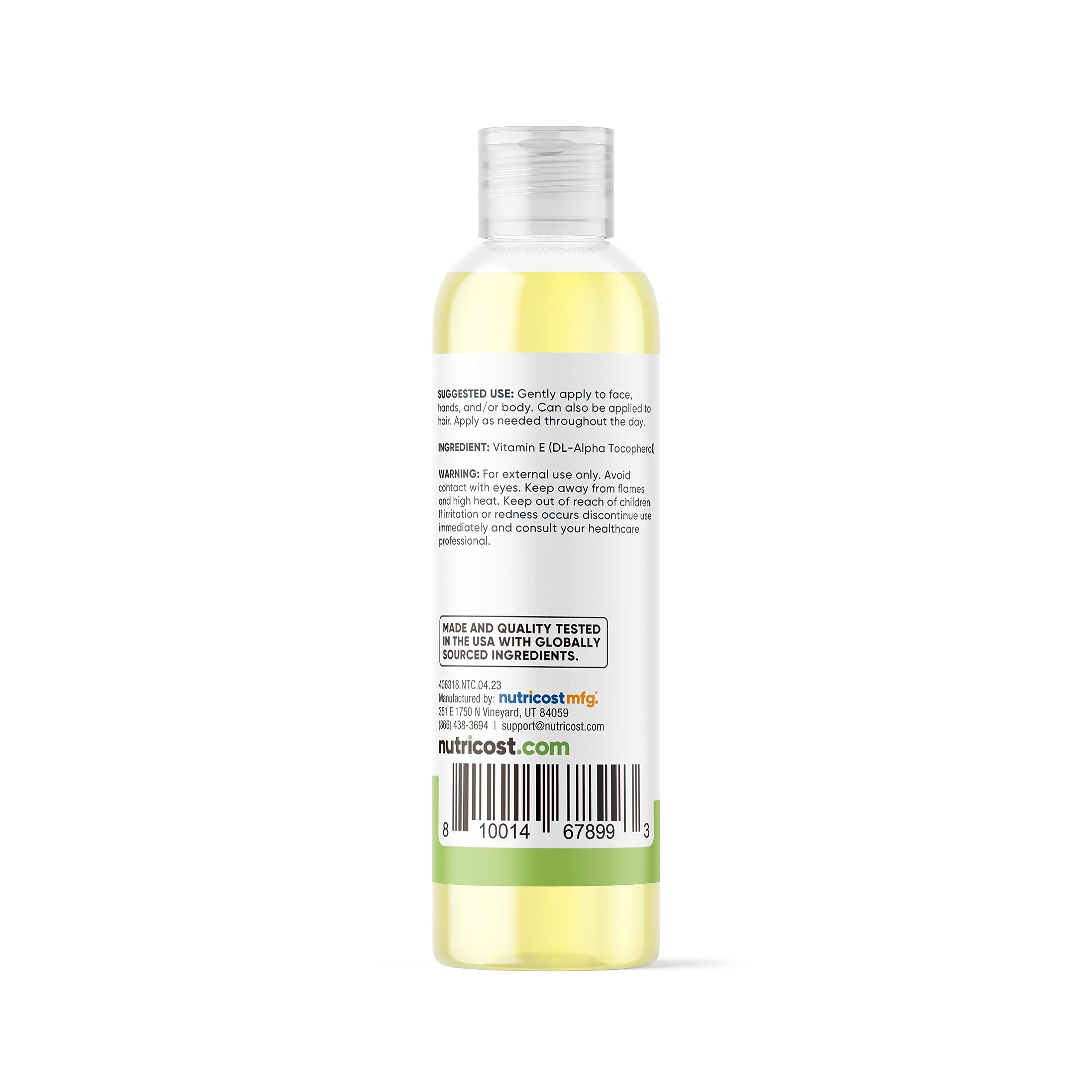 Applying Nutricost Vitamin E Oil to skin for hydration and conditioning.