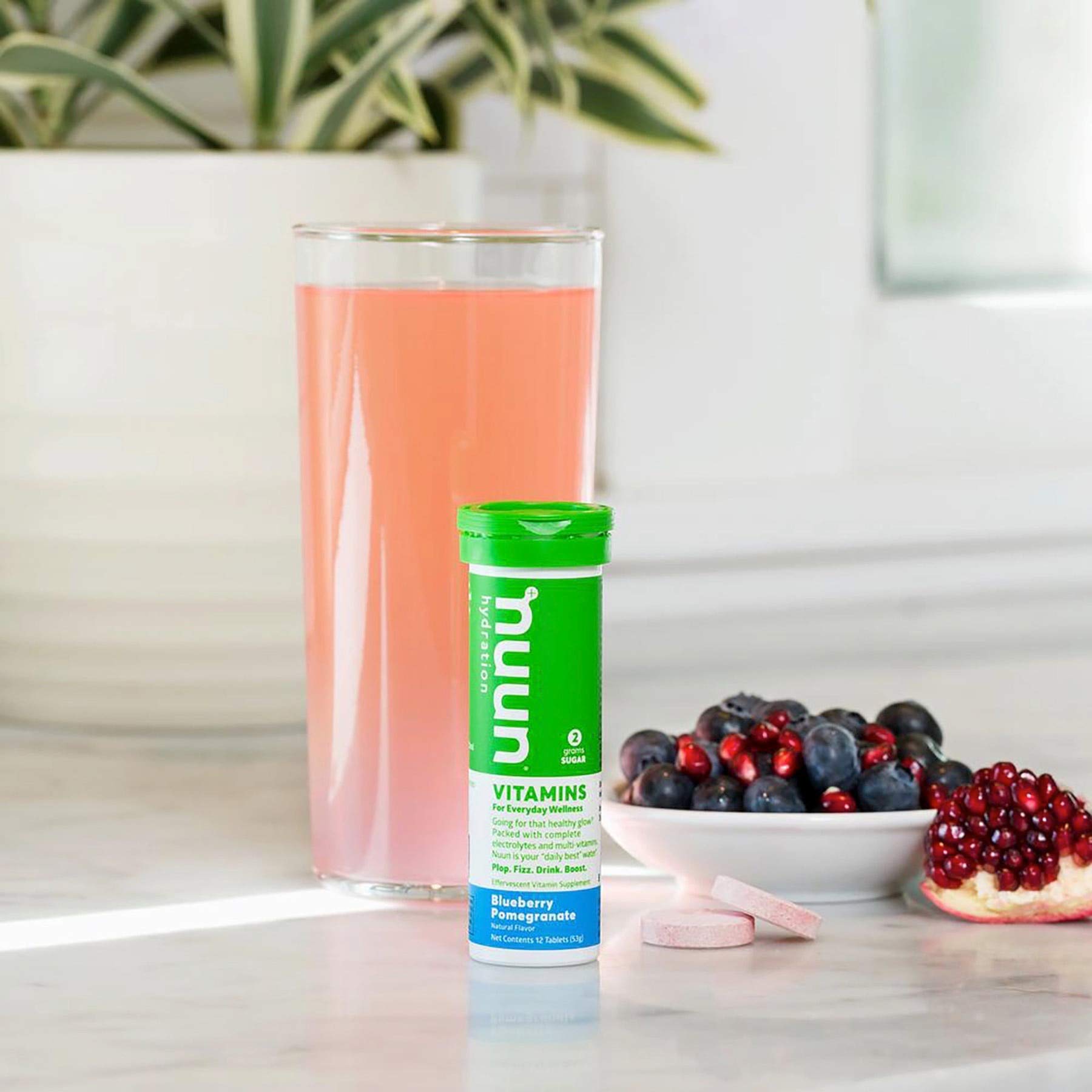 Close-up of Nuun package highlighting vegan, non-GMO, gluten-free promise.