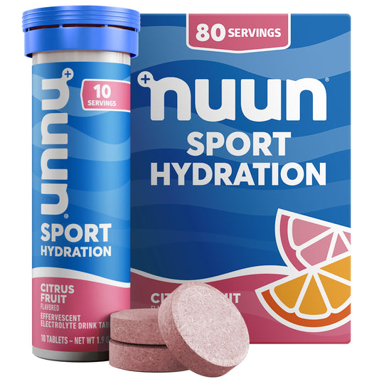 Nuun Citrus Fruit electrolyte tabs dissolving in a glass for clean hydration on the go.