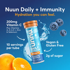 Nuun Immunity Blueberry Tangerine tablets in glass, inviting flavor.