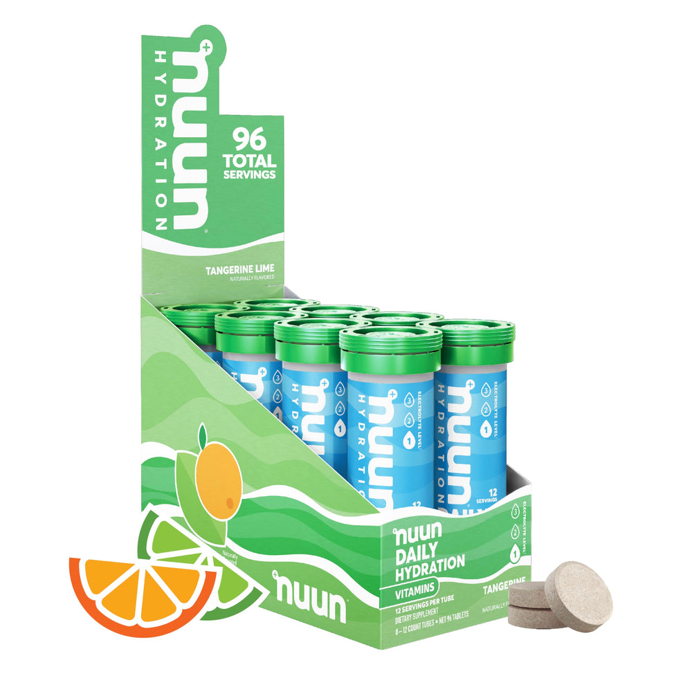 Nuun Tangerine Lime tablets dissolving in water for refreshing hydration on the go