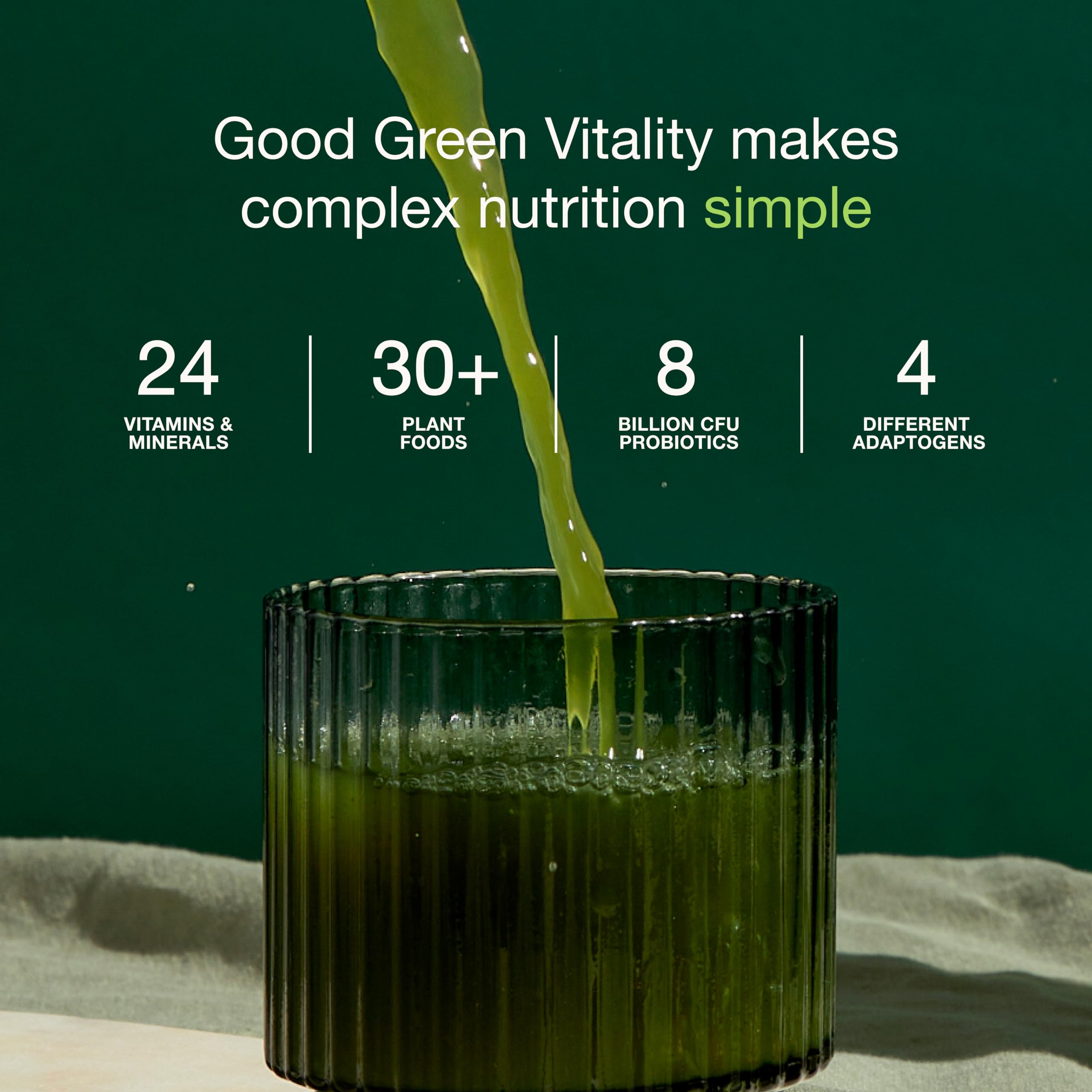 Nuzest Good Green Vitality powder in glass demonstrates mixing into a morning shake
