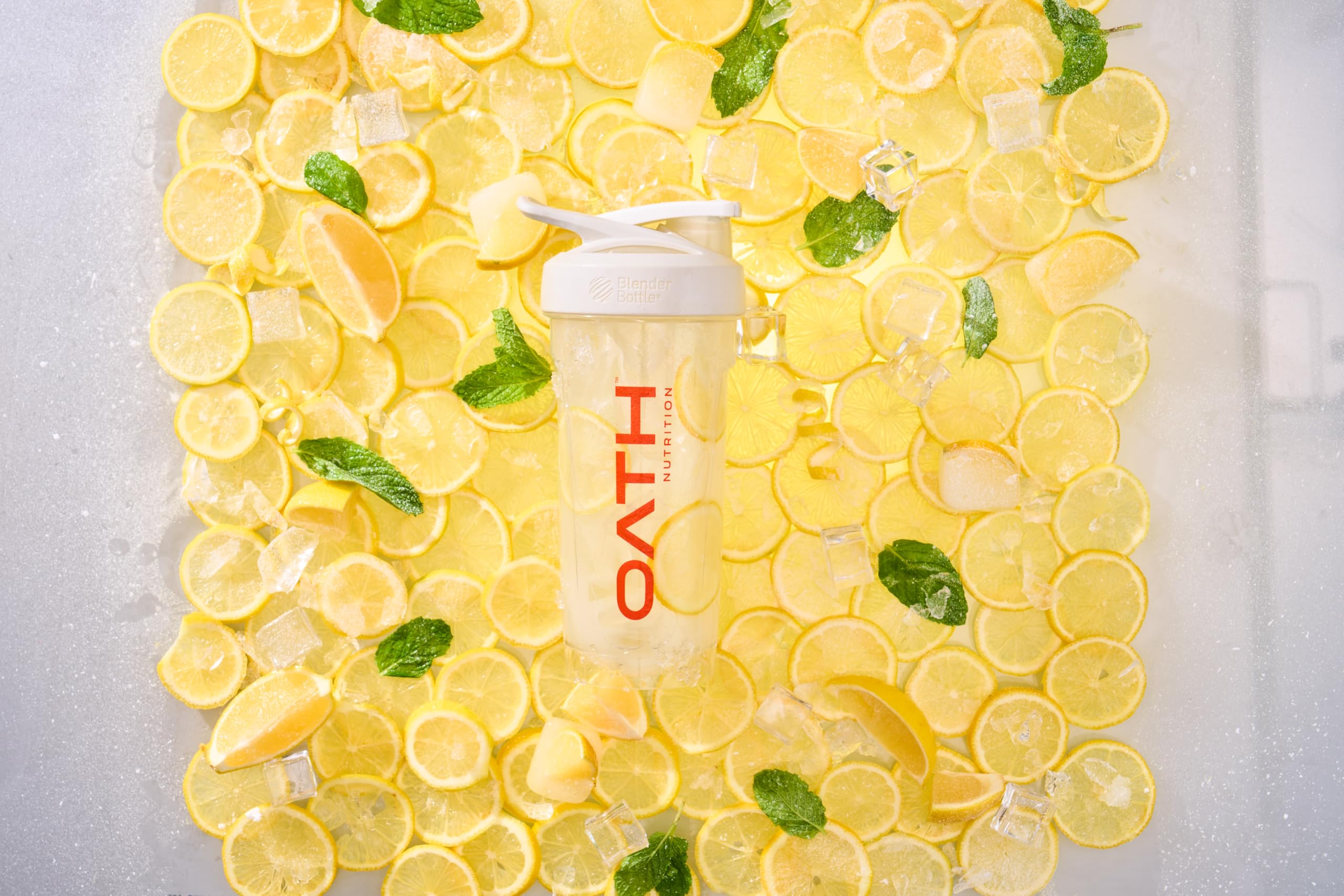 Oath Clear Whey Lemonade bottle beside sunny beach scene