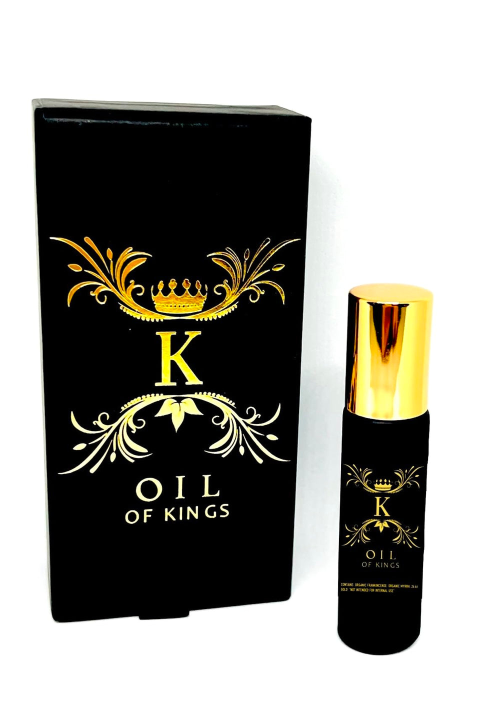 Oil Of Kings frankincense-myrh roll-on closeup highlighting premium glass bottle.